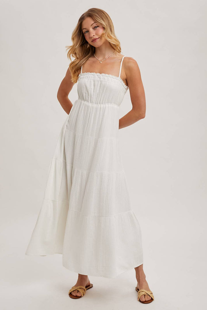 Ivory smocked ruffle trim tiered maxi dress – front view