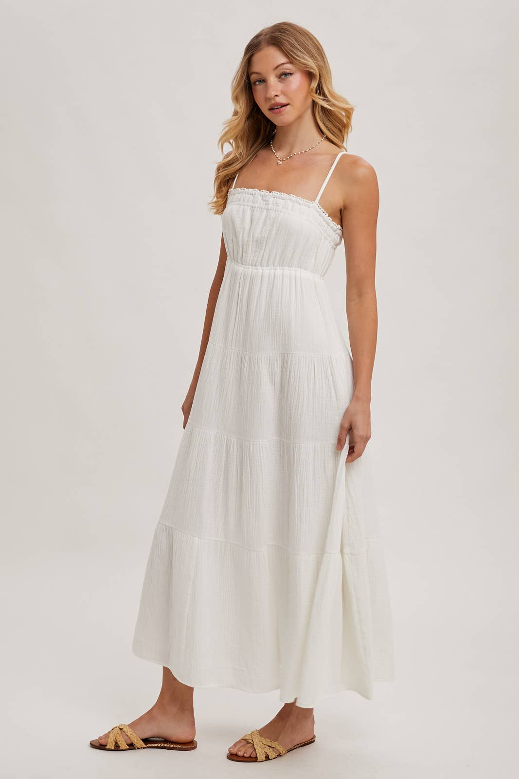 Ivory smocked ruffle trim tiered maxi dress – front view