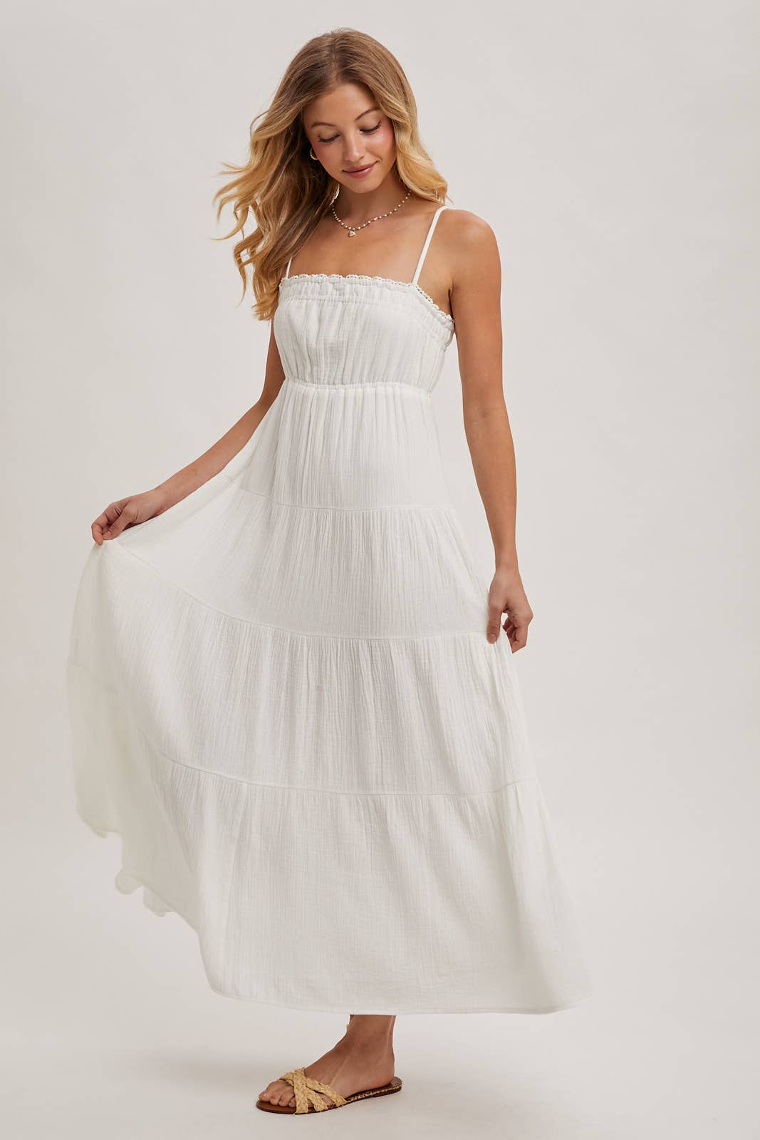 Ivory smocked ruffle trim tiered maxi dress – front view