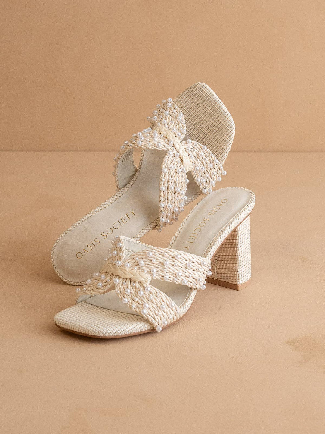 White pearl embroidered raffia block heel front view