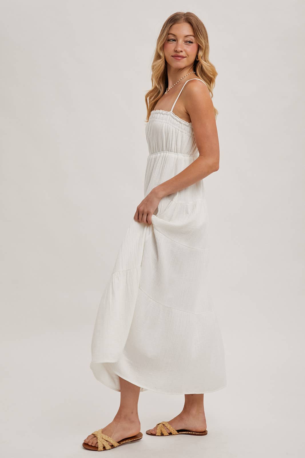 Ivory smocked ruffle trim tiered maxi dress – side view